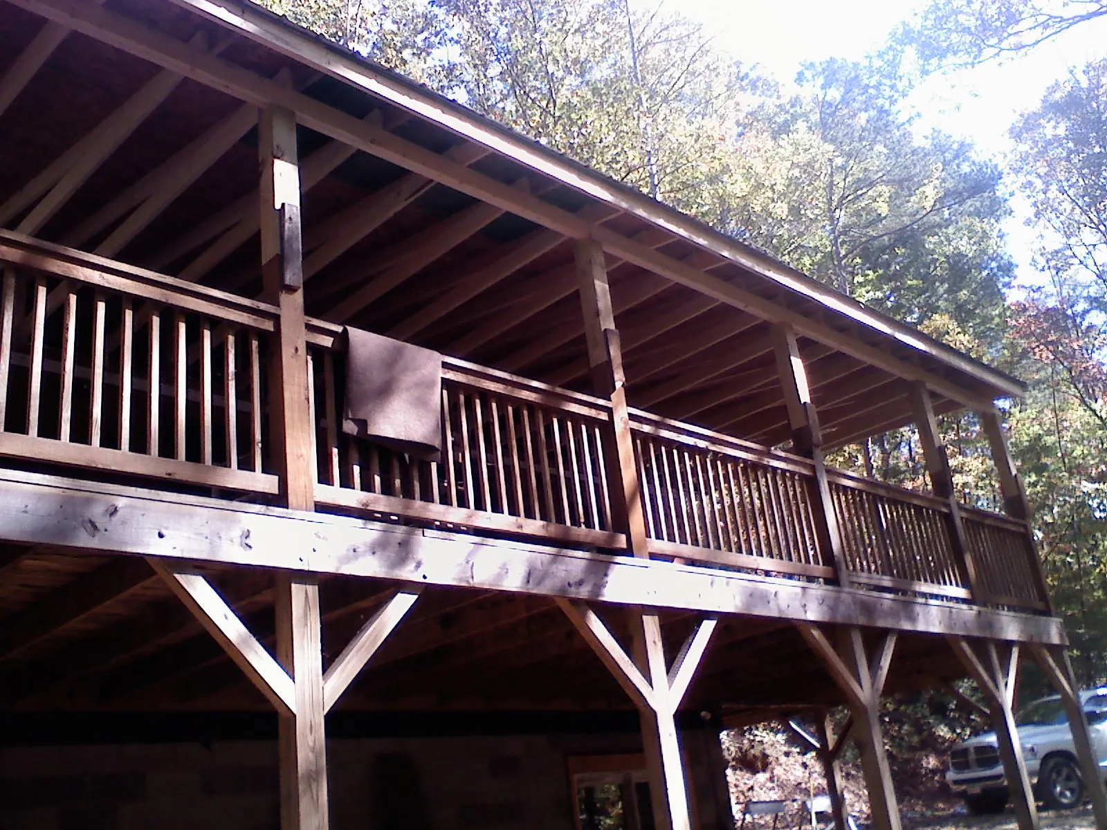 Timber framing under a new elevated porch and deck — Roof Leak Repair in Holbrook by Roofing Brothers